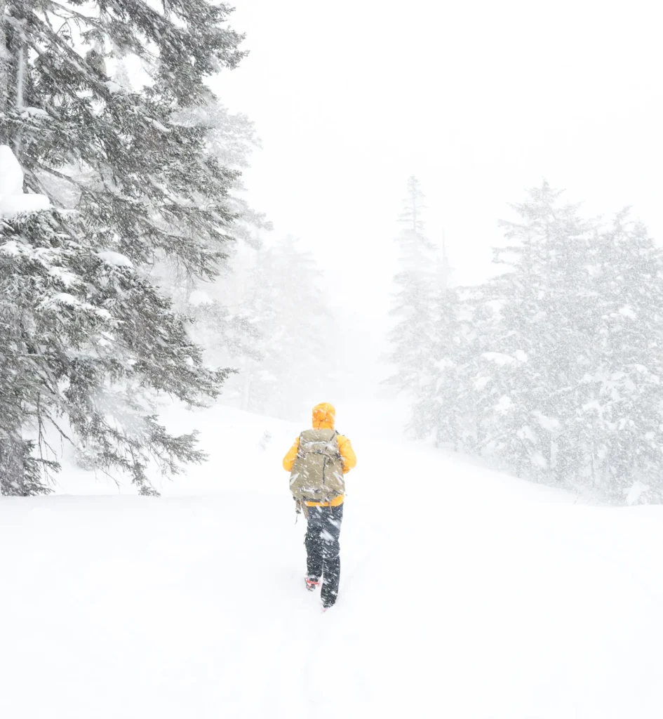 A lone hiker in a blizzard